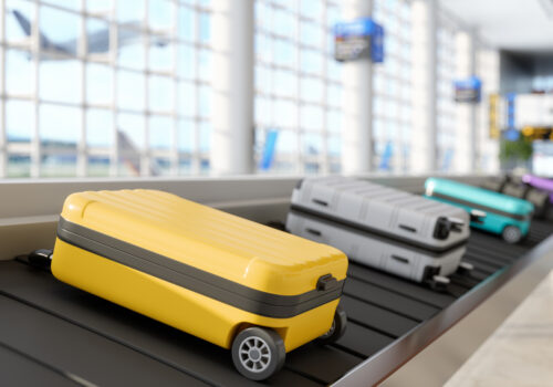 Close-up Of Luggage On Conveyor Belt In Airport on the way to Puerto Rico